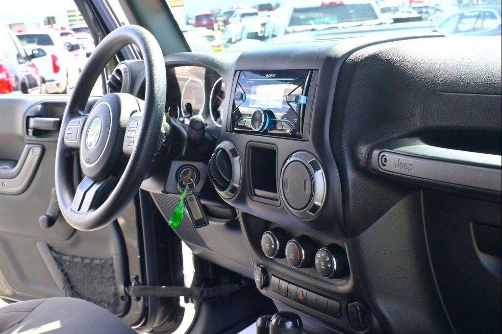 used 2017 Jeep Wrangler Unlimited car, priced at $16,327