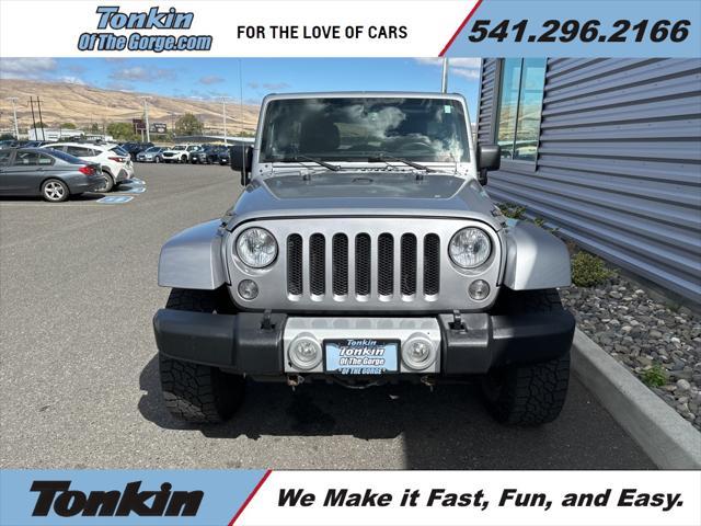 used 2014 Jeep Wrangler Unlimited car, priced at $20,495