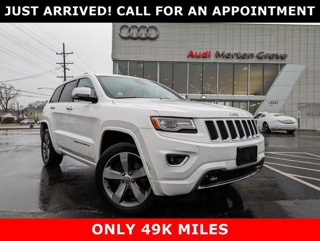 used 2014 Jeep Grand Cherokee car, priced at $21,749
