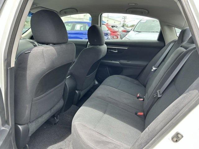 used 2014 Nissan Altima car, priced at $10,000