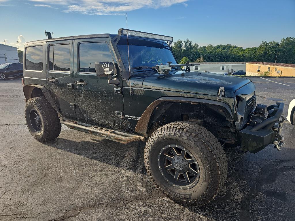 used 2011 Jeep Wrangler Unlimited car, priced at $12,900