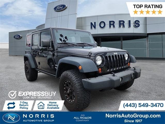 used 2012 Jeep Wrangler Unlimited car, priced at $11,995
