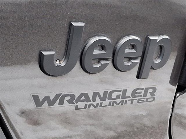 used 2021 Jeep Wrangler Unlimited car, priced at $27,987