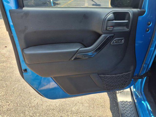 used 2015 Jeep Wrangler Unlimited car, priced at $18,349