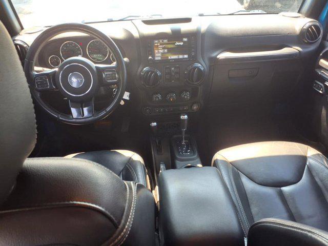 used 2015 Jeep Wrangler Unlimited car, priced at $18,349