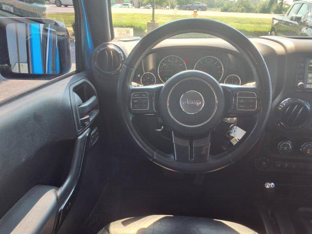 used 2015 Jeep Wrangler Unlimited car, priced at $18,349