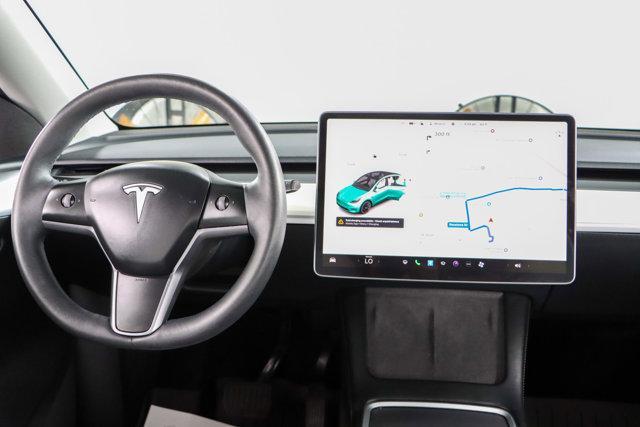 used 2023 Tesla Model Y car, priced at $30,995