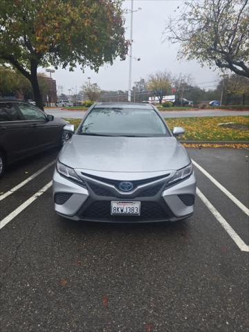 used 2019 Toyota Camry Hybrid car, priced at $25,976