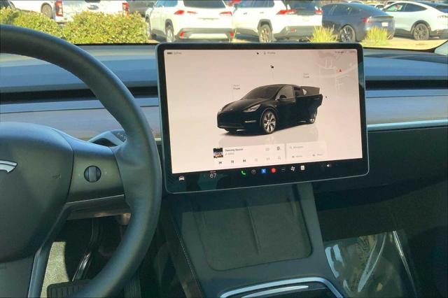 used 2024 Tesla Model Y car, priced at $32,956