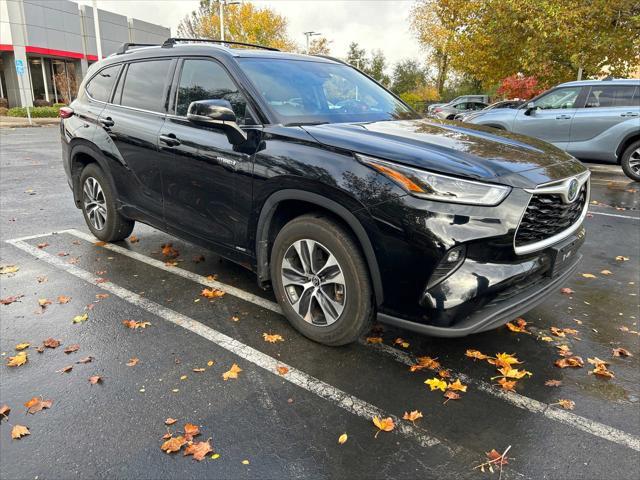 used 2021 Toyota Highlander Hybrid car, priced at $42,976