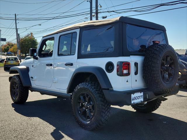 used 2021 Jeep Wrangler Unlimited car, priced at $33,991