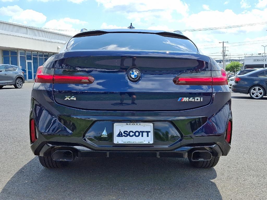 used 2023 BMW X4 car, priced at $56,595