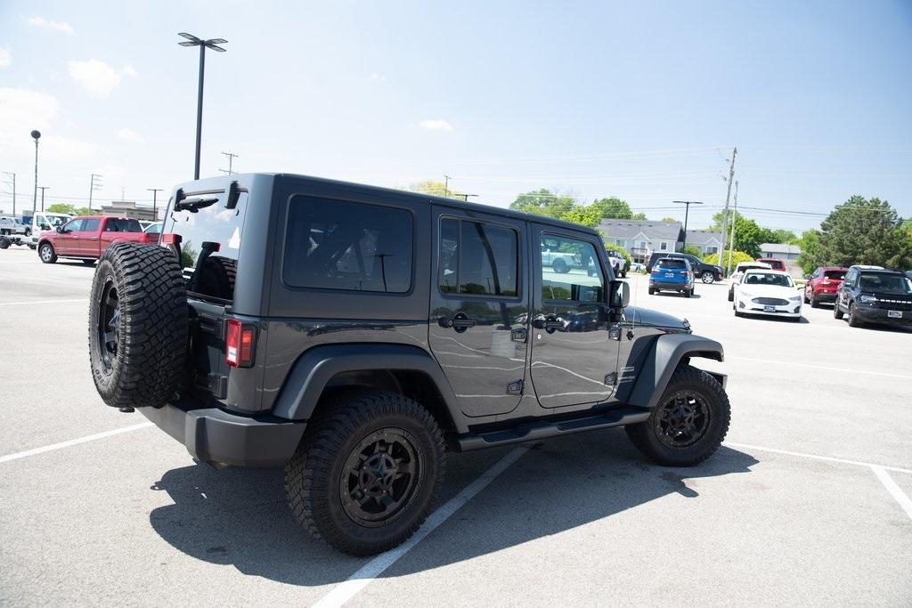 used 2018 Jeep Wrangler JK Unlimited car, priced at $25,509