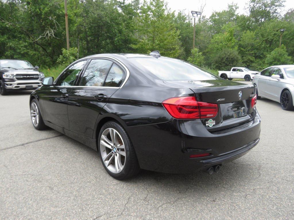used 2018 BMW 330 car, priced at $19,052