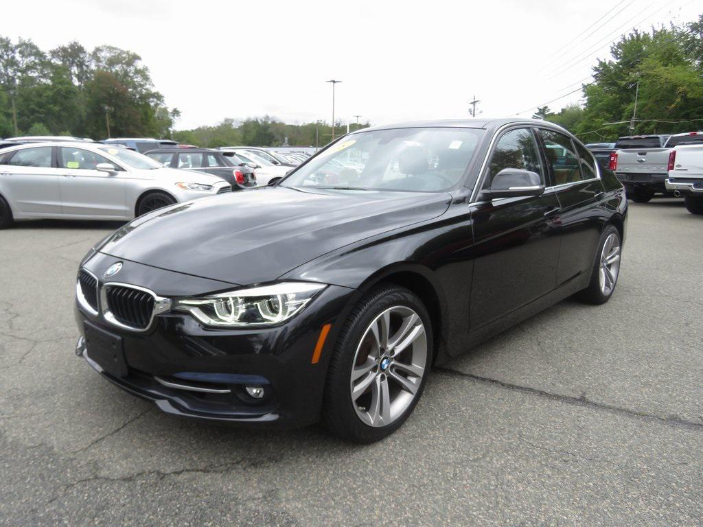 used 2018 BMW 330 car, priced at $19,052