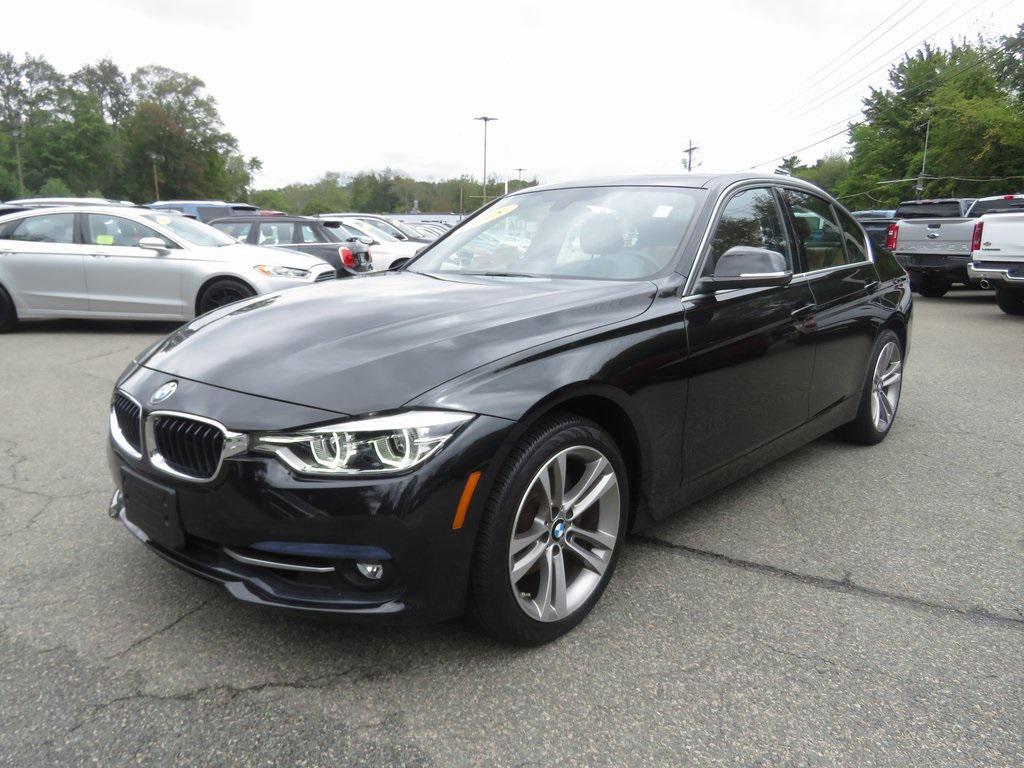 used 2018 BMW 330 car, priced at $19,052