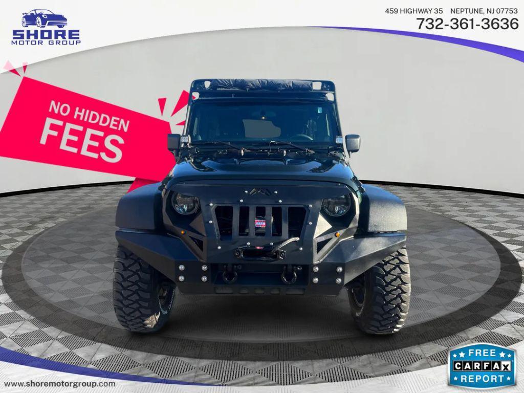 used 2011 Jeep Wrangler Unlimited car, priced at $13,998