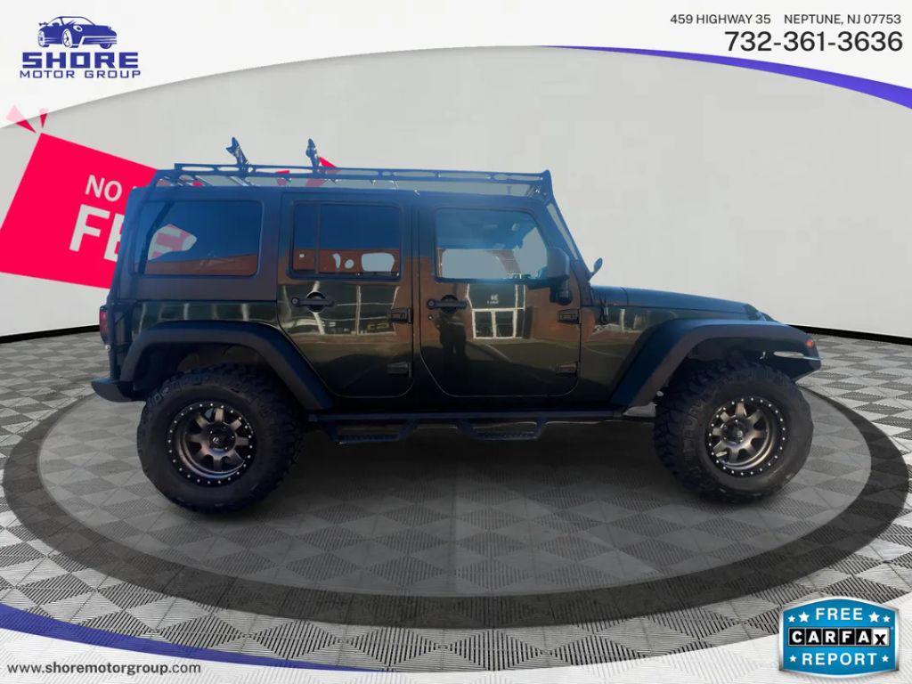 used 2011 Jeep Wrangler Unlimited car, priced at $13,998