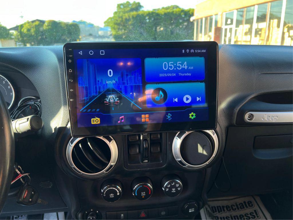 used 2011 Jeep Wrangler Unlimited car, priced at $13,998