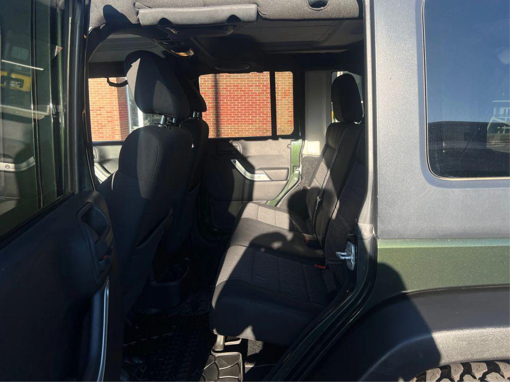 used 2011 Jeep Wrangler Unlimited car, priced at $13,998