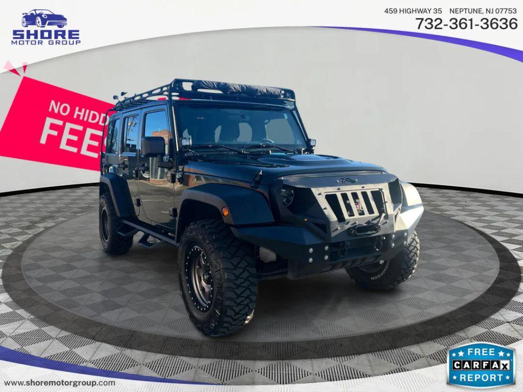 used 2011 Jeep Wrangler Unlimited car, priced at $13,998