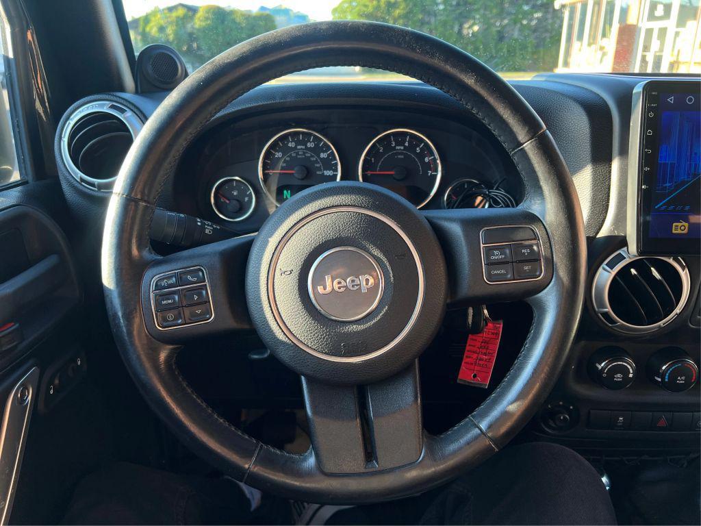 used 2011 Jeep Wrangler Unlimited car, priced at $13,998