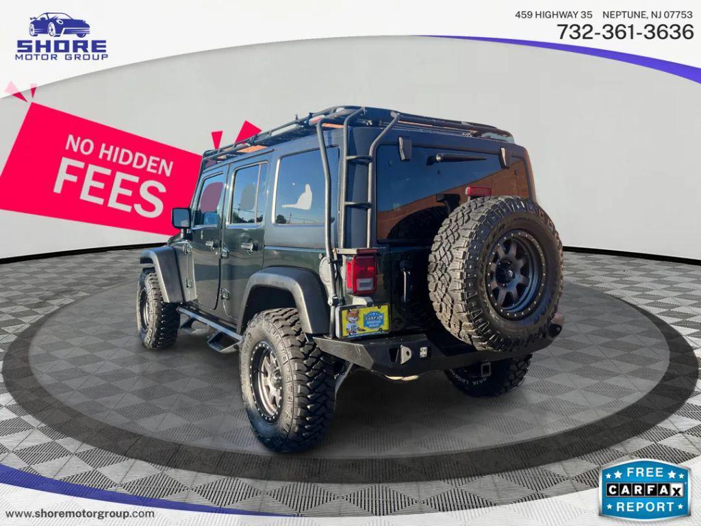 used 2011 Jeep Wrangler Unlimited car, priced at $13,998