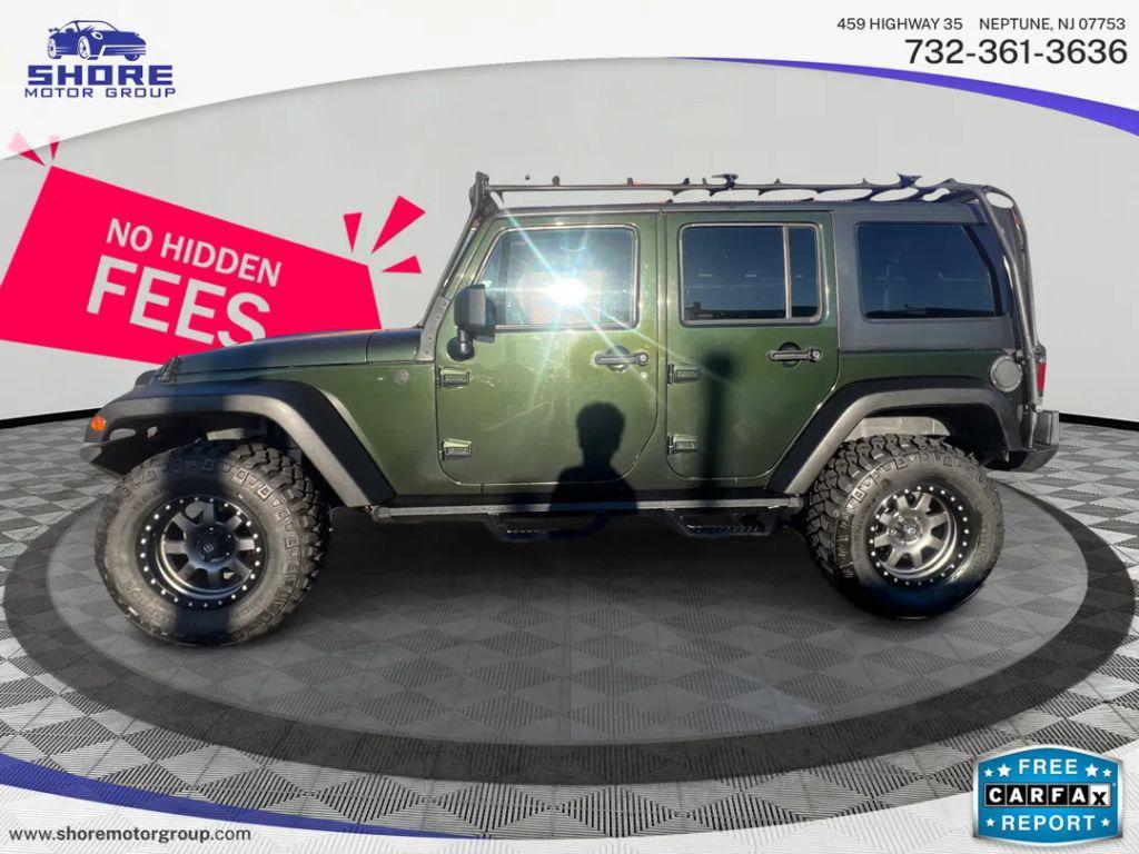 used 2011 Jeep Wrangler Unlimited car, priced at $13,998