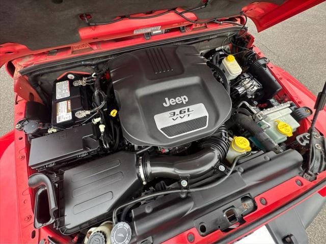 used 2013 Jeep Wrangler Unlimited car, priced at $15,998