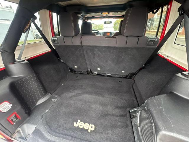 used 2013 Jeep Wrangler Unlimited car, priced at $15,998