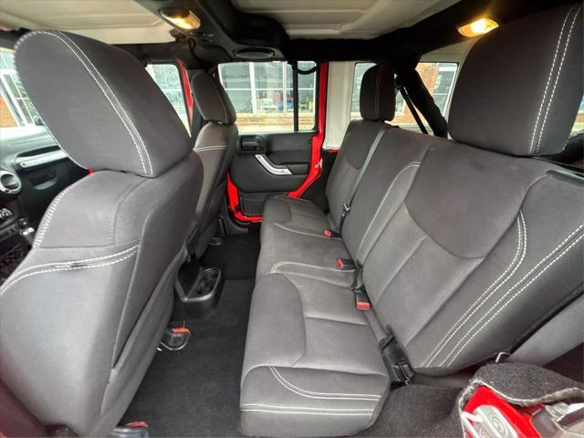 used 2013 Jeep Wrangler Unlimited car, priced at $15,998