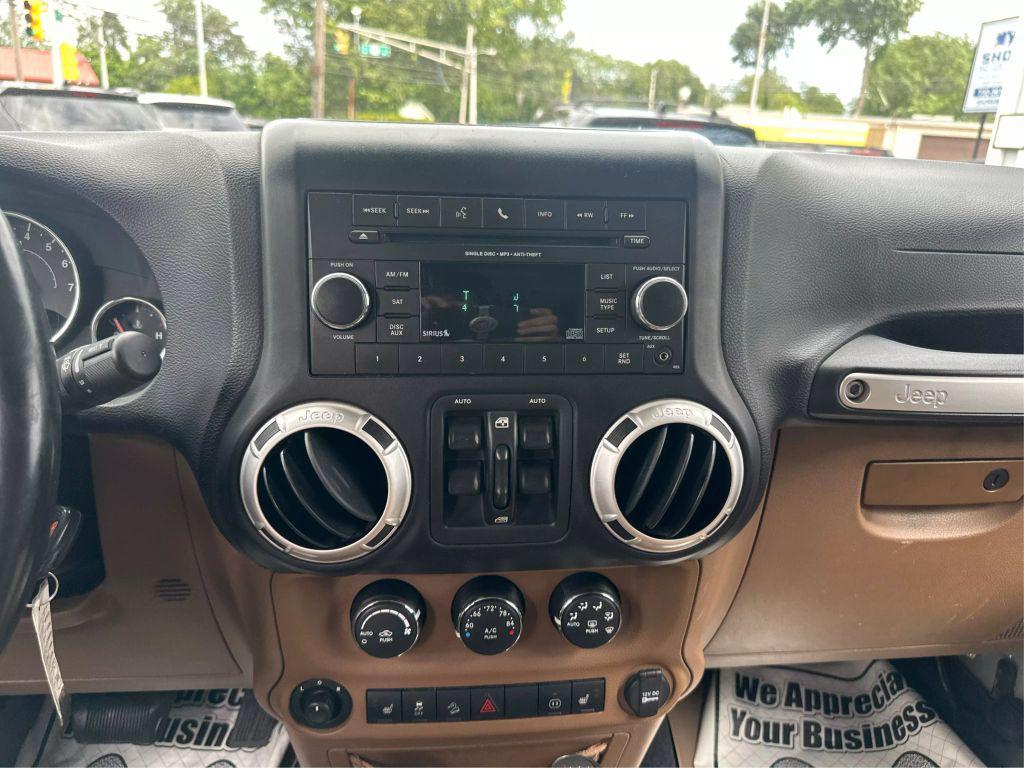 used 2012 Jeep Wrangler Unlimited car, priced at $10,998