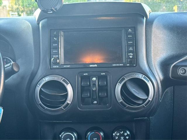 used 2016 Jeep Wrangler Unlimited car, priced at $18,498