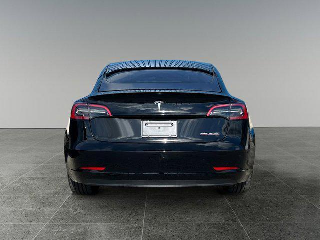used 2023 Tesla Model 3 car, priced at $35,999