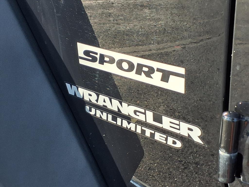 used 2014 Jeep Wrangler Unlimited car, priced at $19,341