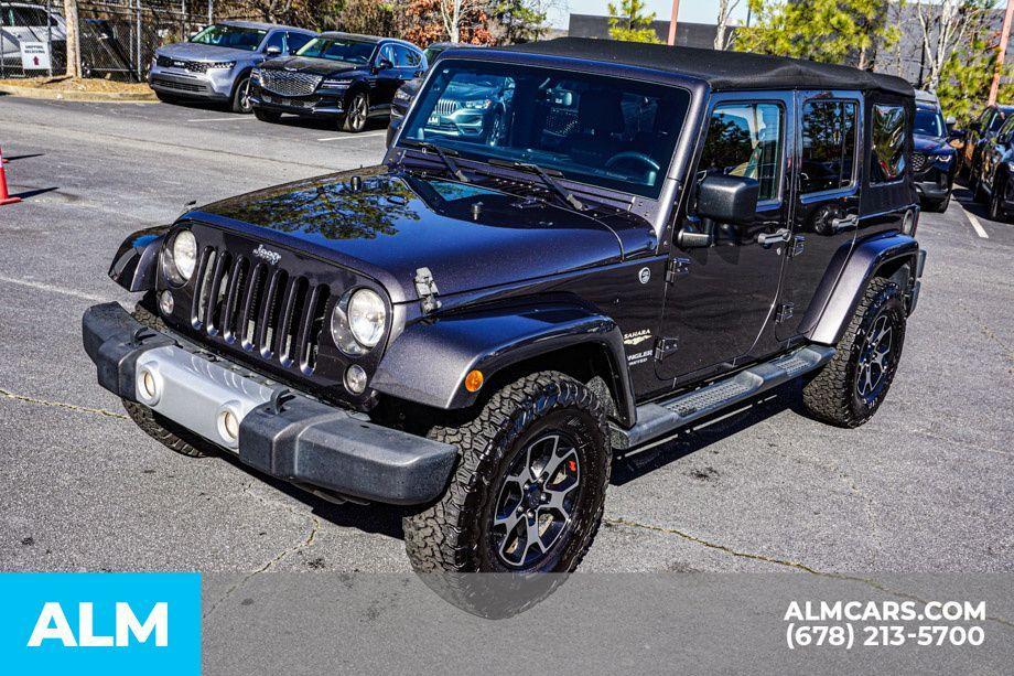 used 2014 Jeep Wrangler Unlimited car, priced at $16,920