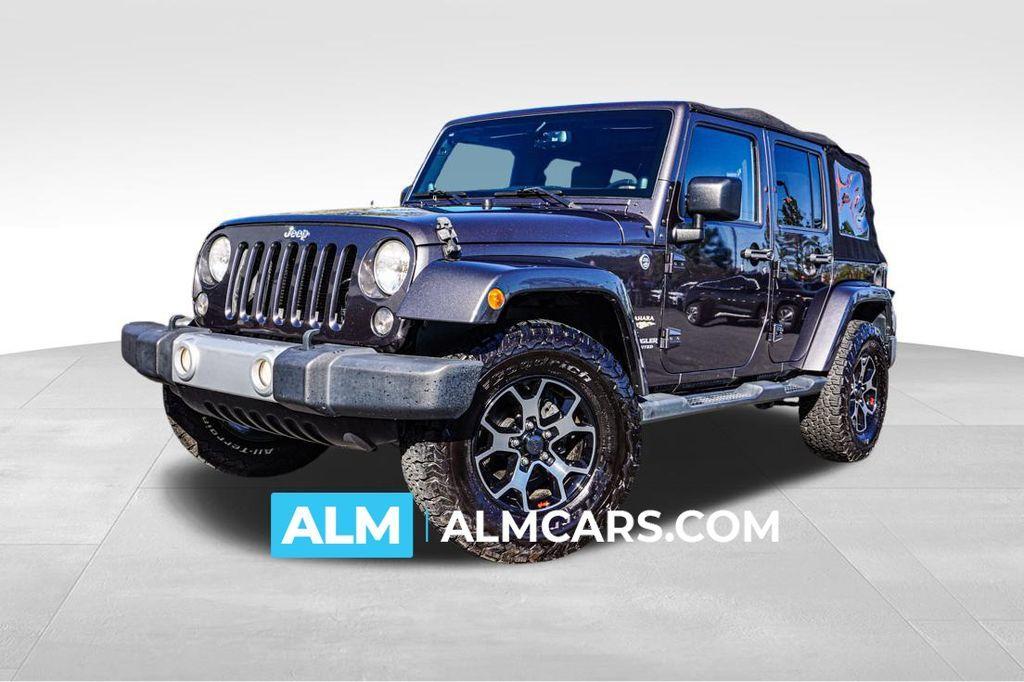 used 2014 Jeep Wrangler Unlimited car, priced at $16,920