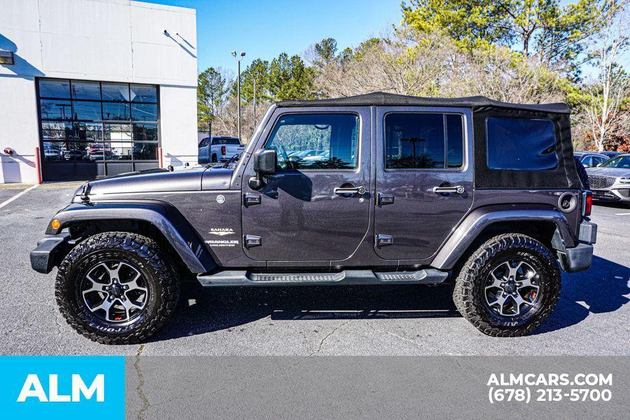 used 2014 Jeep Wrangler Unlimited car, priced at $16,920