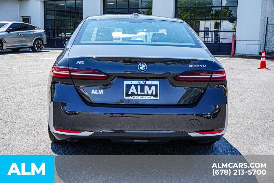 used 2024 BMW i5 car, priced at $53,920