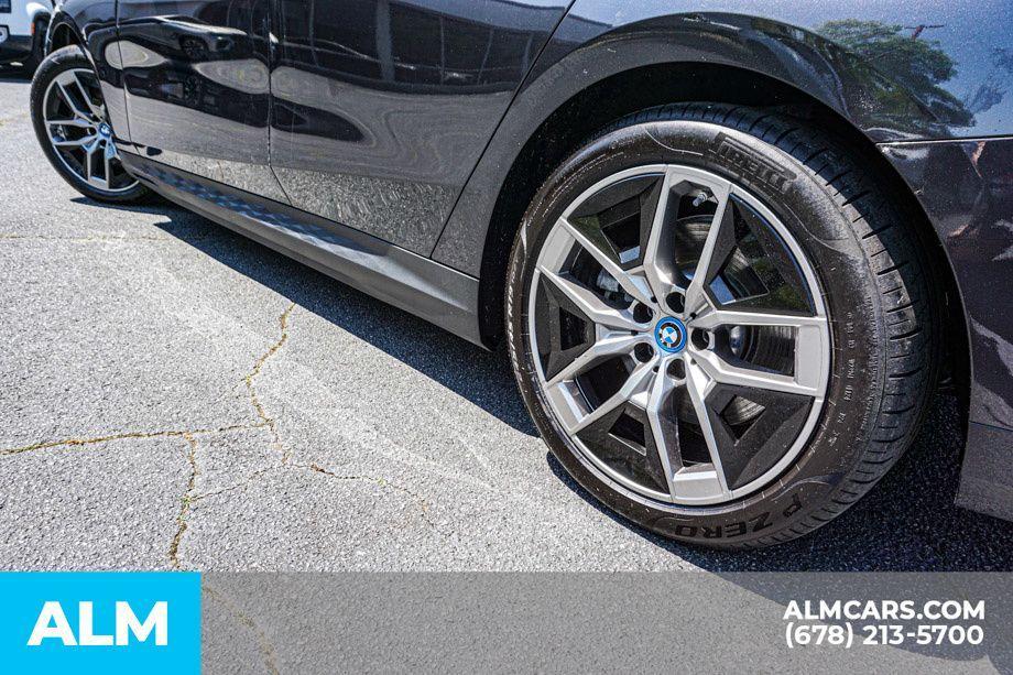 used 2024 BMW i5 car, priced at $53,920
