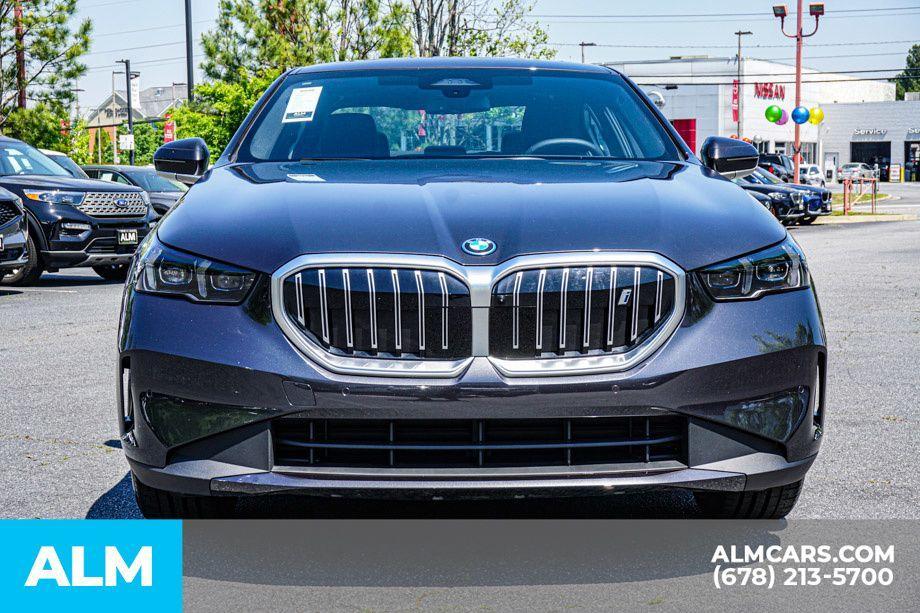 used 2024 BMW i5 car, priced at $53,920
