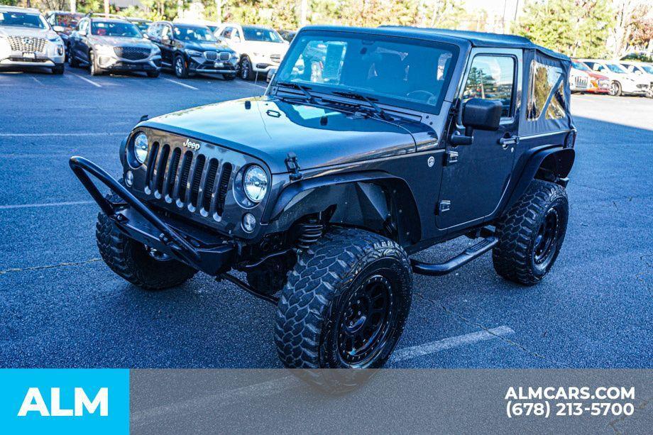 used 2014 Jeep Wrangler car, priced at $15,920