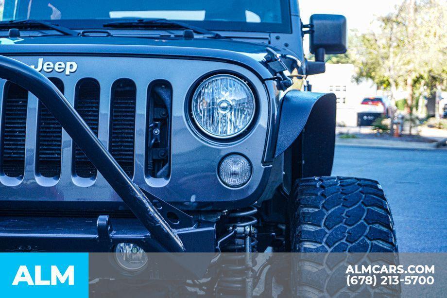 used 2014 Jeep Wrangler car, priced at $15,920