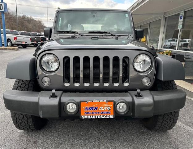 used 2018 Jeep Wrangler JK Unlimited car, priced at $21,888