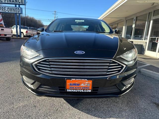 used 2018 Ford Fusion car, priced at $13,887