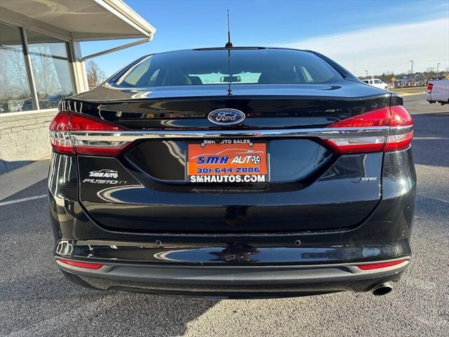 used 2018 Ford Fusion car, priced at $13,887