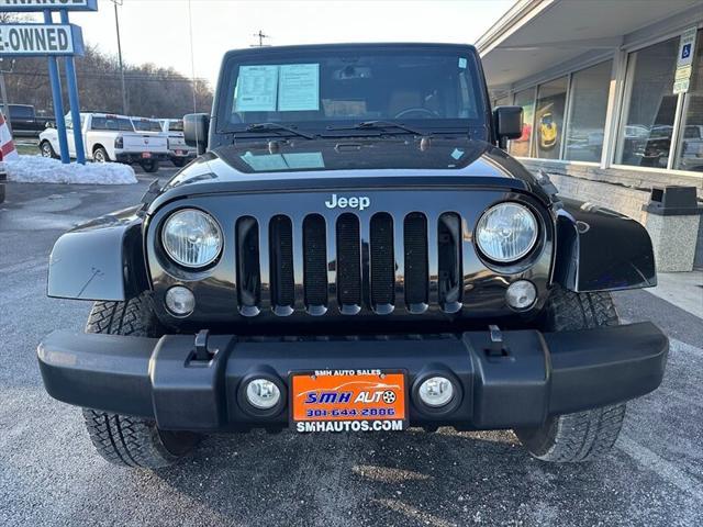 used 2014 Jeep Wrangler Unlimited car, priced at $18,898