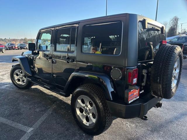 used 2014 Jeep Wrangler Unlimited car, priced at $18,898