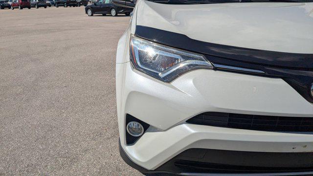 used 2018 Toyota RAV4 car, priced at $19,880