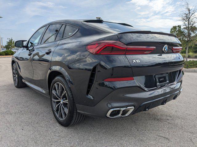 used 2024 BMW X6 car, priced at $74,990